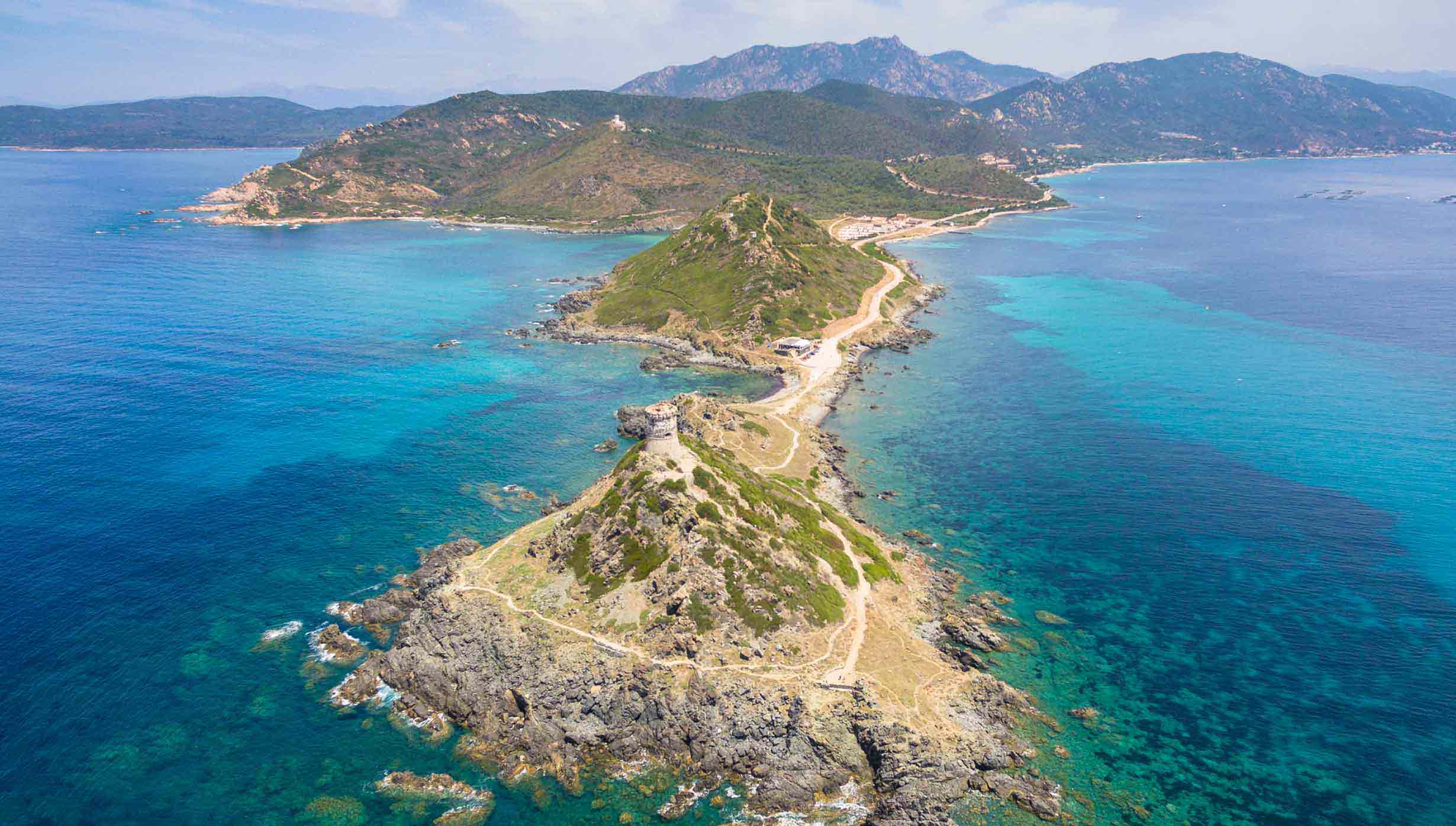 A scenic coastal view with turquoise waters and rugged landscapes in the Mediterranean | MSC Cruises A scenic coastal view with turquoise waters and rugged landscapes in the Mediterranean | MSC Cruises