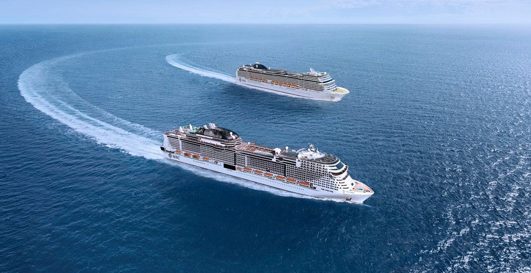 Two MSC cruise ships navigating the open ocean in a graceful curve | MSC Cruises