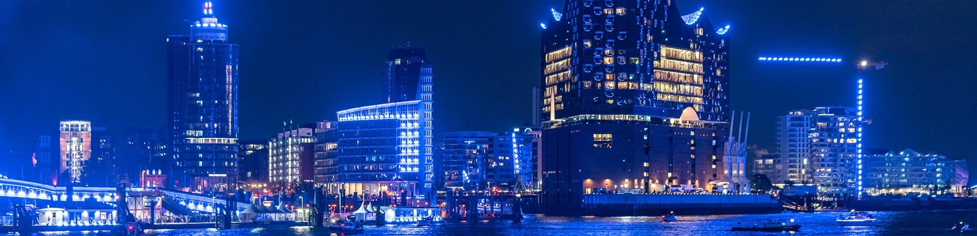 Hamburg's illuminated skyline with the Elbphilharmonie at night | MSC Cruises Hamburg's illuminated skyline with the Elbphilharmonie at night | MSC Cruises