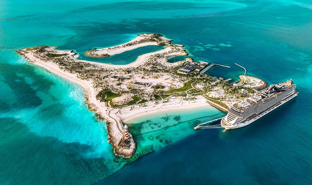 Aerial view of Ocean Cay island with an MSC cruise ship docked in turquoise waters | MSC Cruises Aerial view of Ocean Cay island with an MSC cruise ship docked in turquoise waters | MSC Cruises