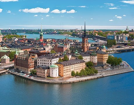Scenic view of Stockholm's old town surrounded by water and historic architecture | MSC Cruises Scenic view of Stockholm's old town surrounded by water and historic architecture | MSC Cruises