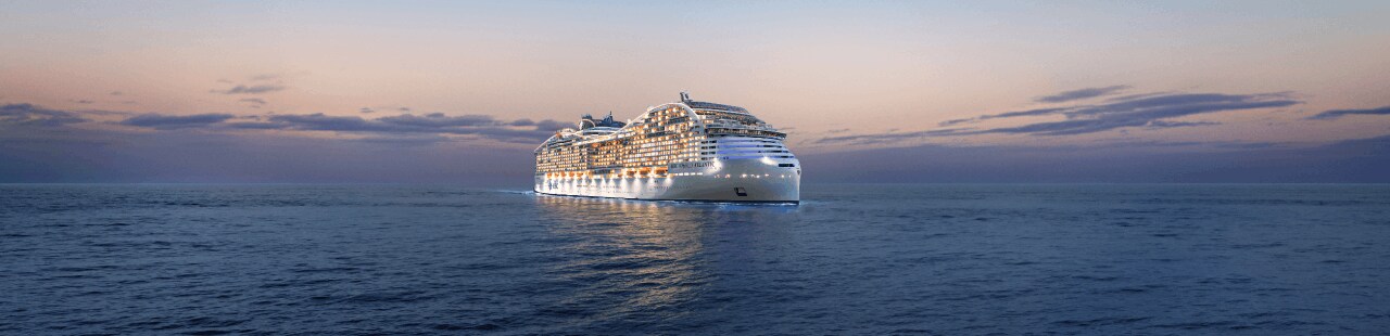 MSC World Atlantic cruise ship sailing on open water at dusk